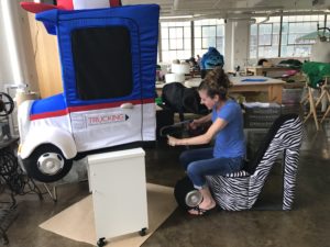 This high-heel chair was perfect for sewing a license plate onto Safety Sammy. the TMAF Truck mascot